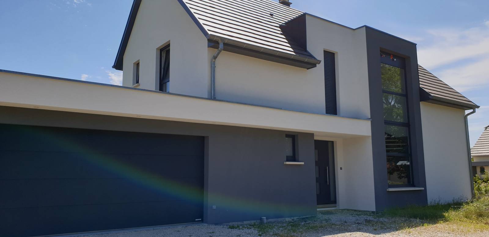 construction d'une maison individuelle avec garage en toit-terrasse
